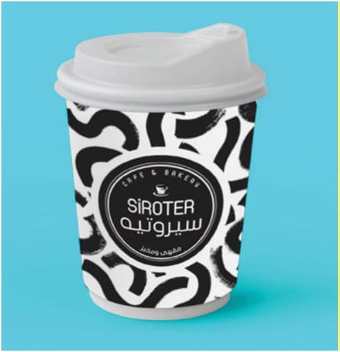 SIROTER patterned coffee cup on a cyan background