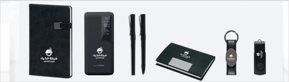 Black notebooks, pens, card holder and USB